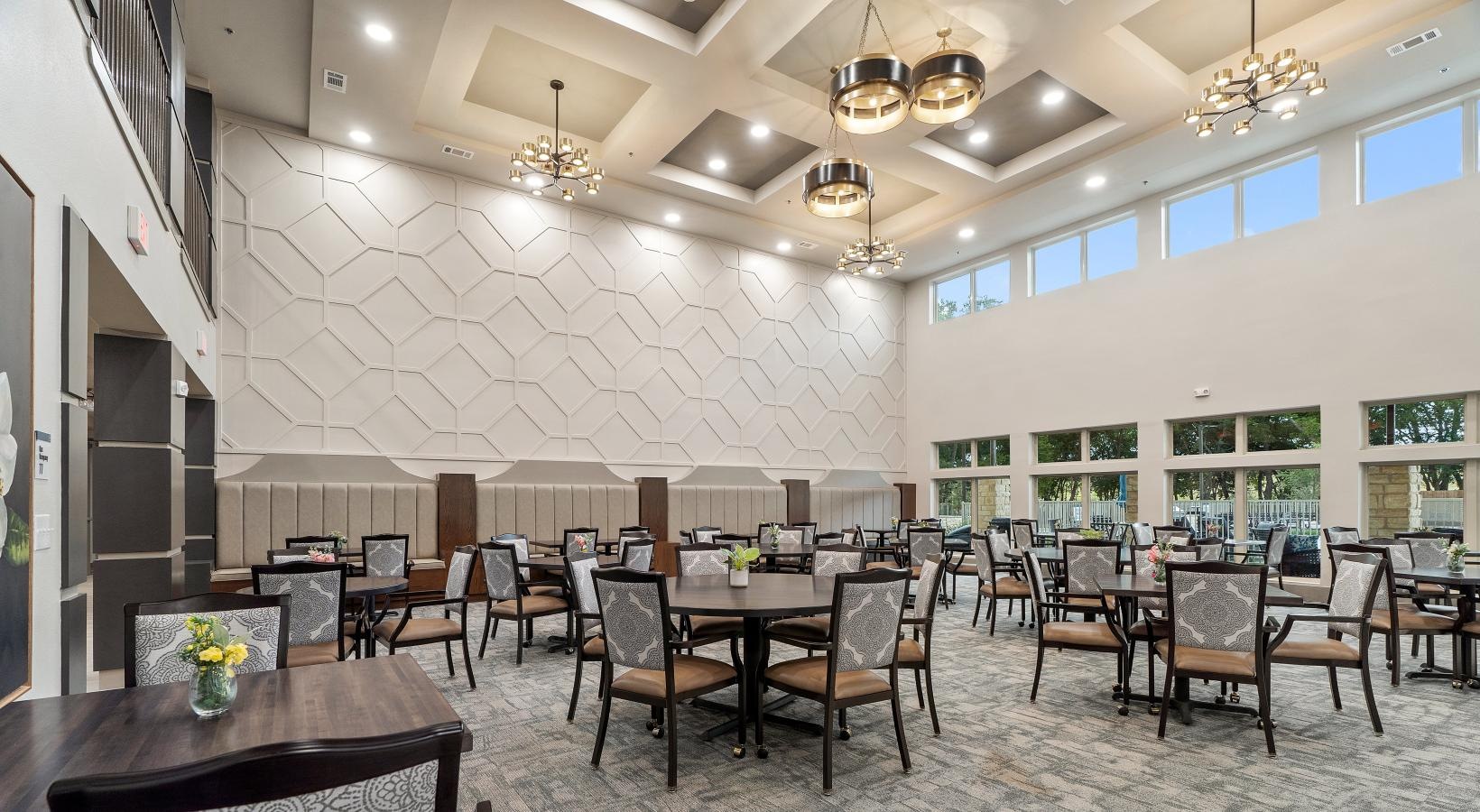 Find your perfect fit at Preserve at Willow Park a large dining room with tables and chairs and windows