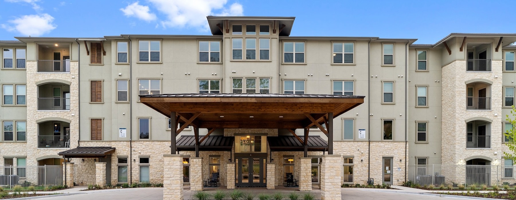 a building with a parking lot in front of it