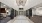 a large white room with a tile floor hallway lobby