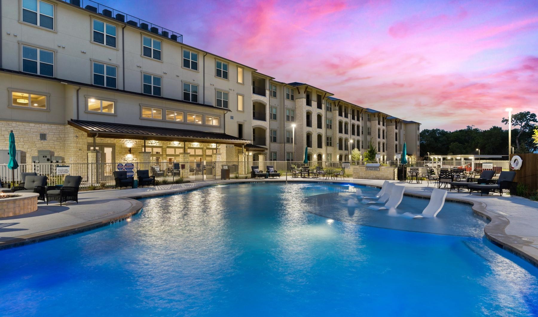 a pool in front of a building