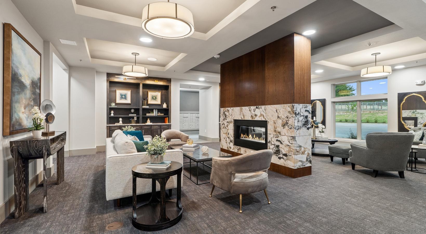 Settle into comfort at Preserve at Willow Park a lounge room with a fireplace and seating