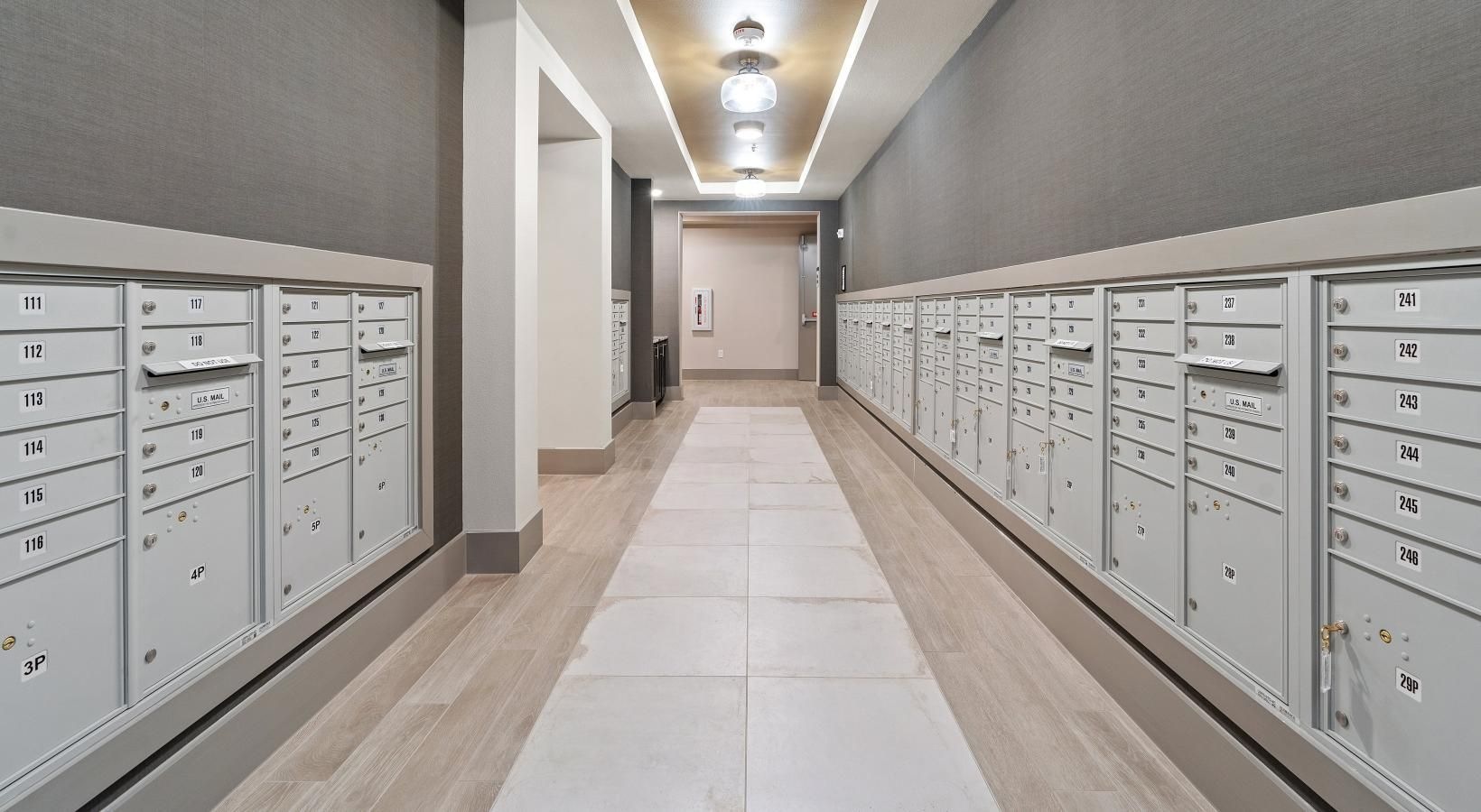 The essence of exceptional living a mail room with many compartments