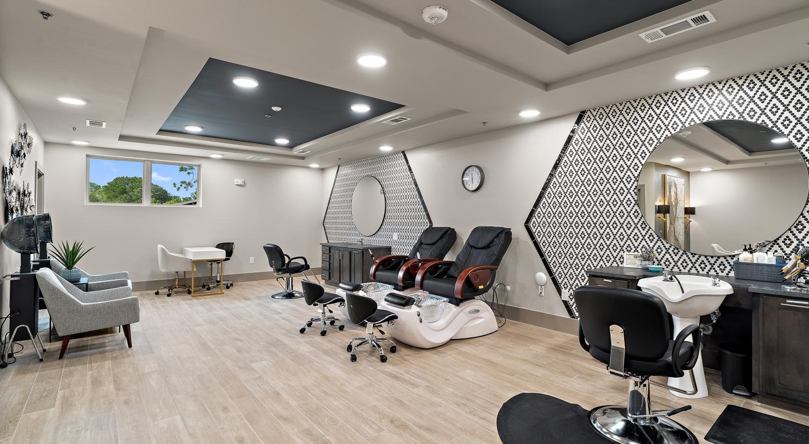 Settle into comfort at Preserve at Willow Park a spa room with large mirrors and spa chairs