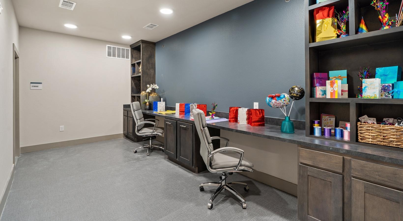 Settle into comfort at Preserve at Willow Park a craft room with a desks and shelves of supplies