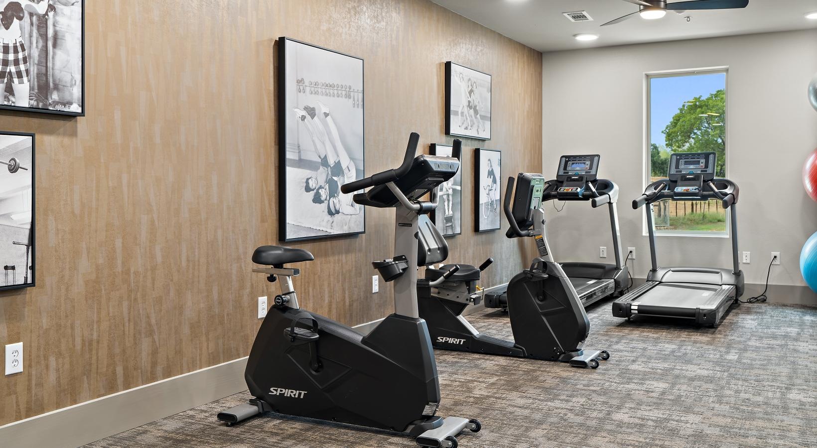 Quick access to state-of-the-art amenities a gym with exercise equipment