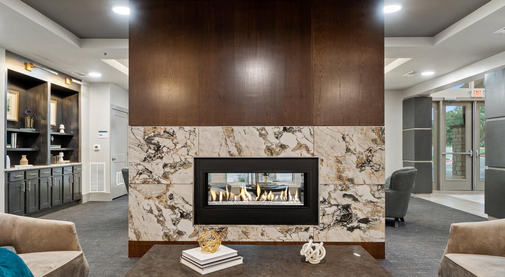 Access to resident-only features a lounge room with a fireplace