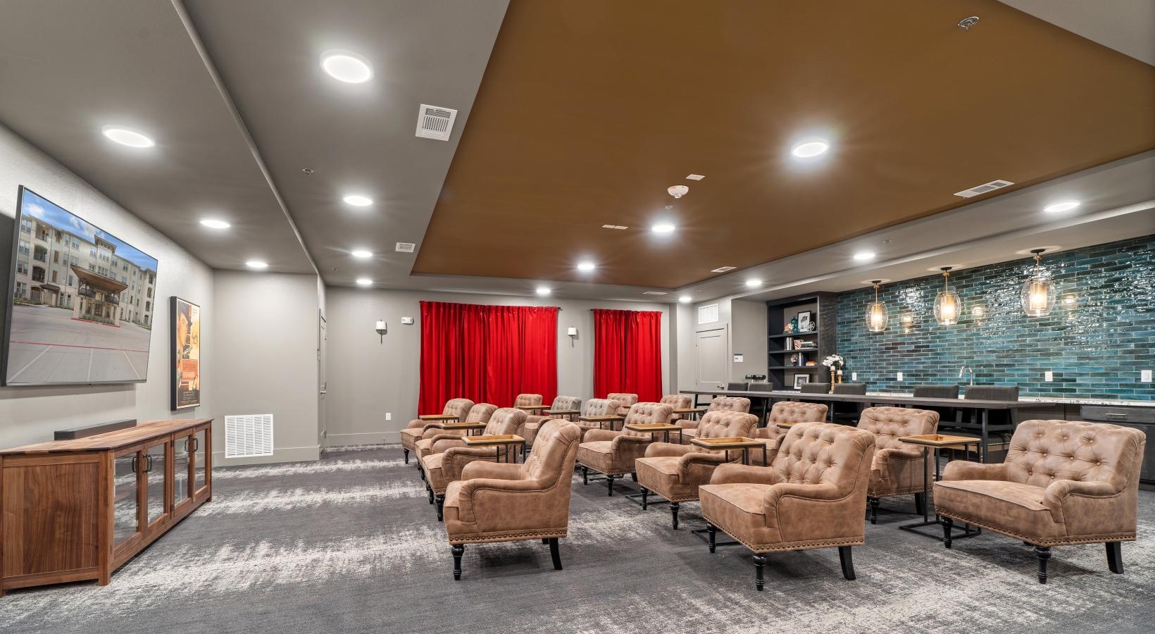 Take advantage of all Preserve at Willow Park has to offer a movie room with many chairs and a table