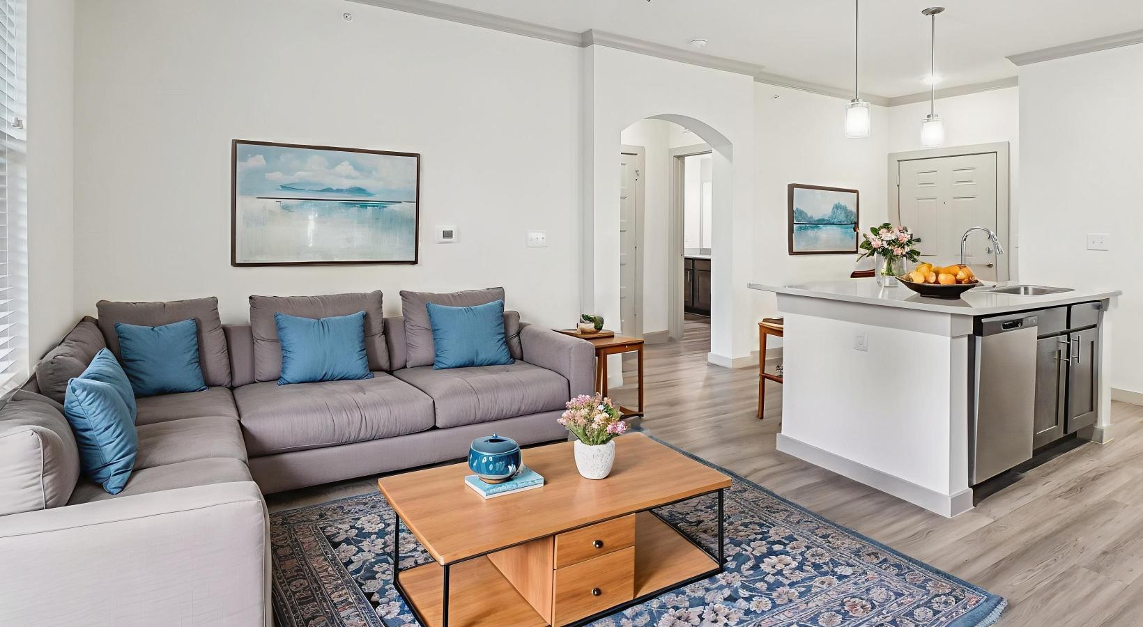 Beautiful living areas to match your lifestyle a living room with a couch and a coffee table