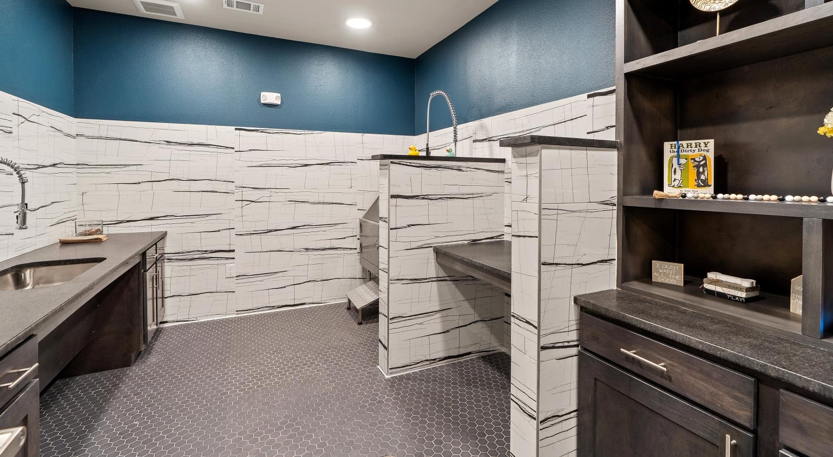 Settle into comfort at Preserve at Willow Park a washroom with a sink and shelves