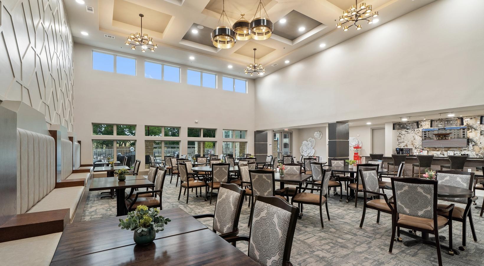 The essence of exceptional living a large room with many tables and chairs