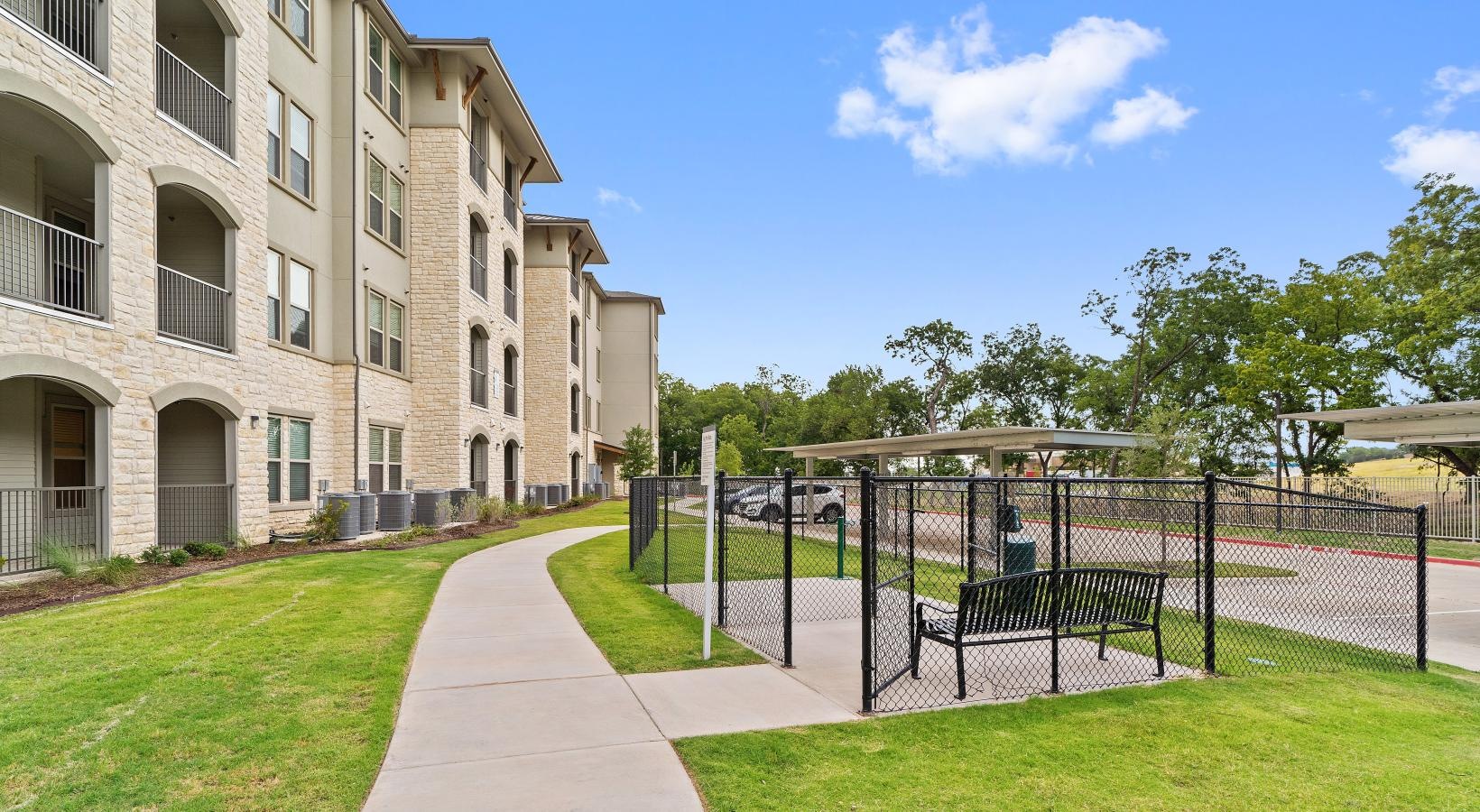 Settle into comfort at Preserve at Willow Park a walkway leading to a building